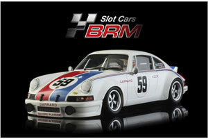 A white vintage race car model with red and blue racing stripes, number 59, shown on a black reflective background with the Slot Cars BRM logo above.